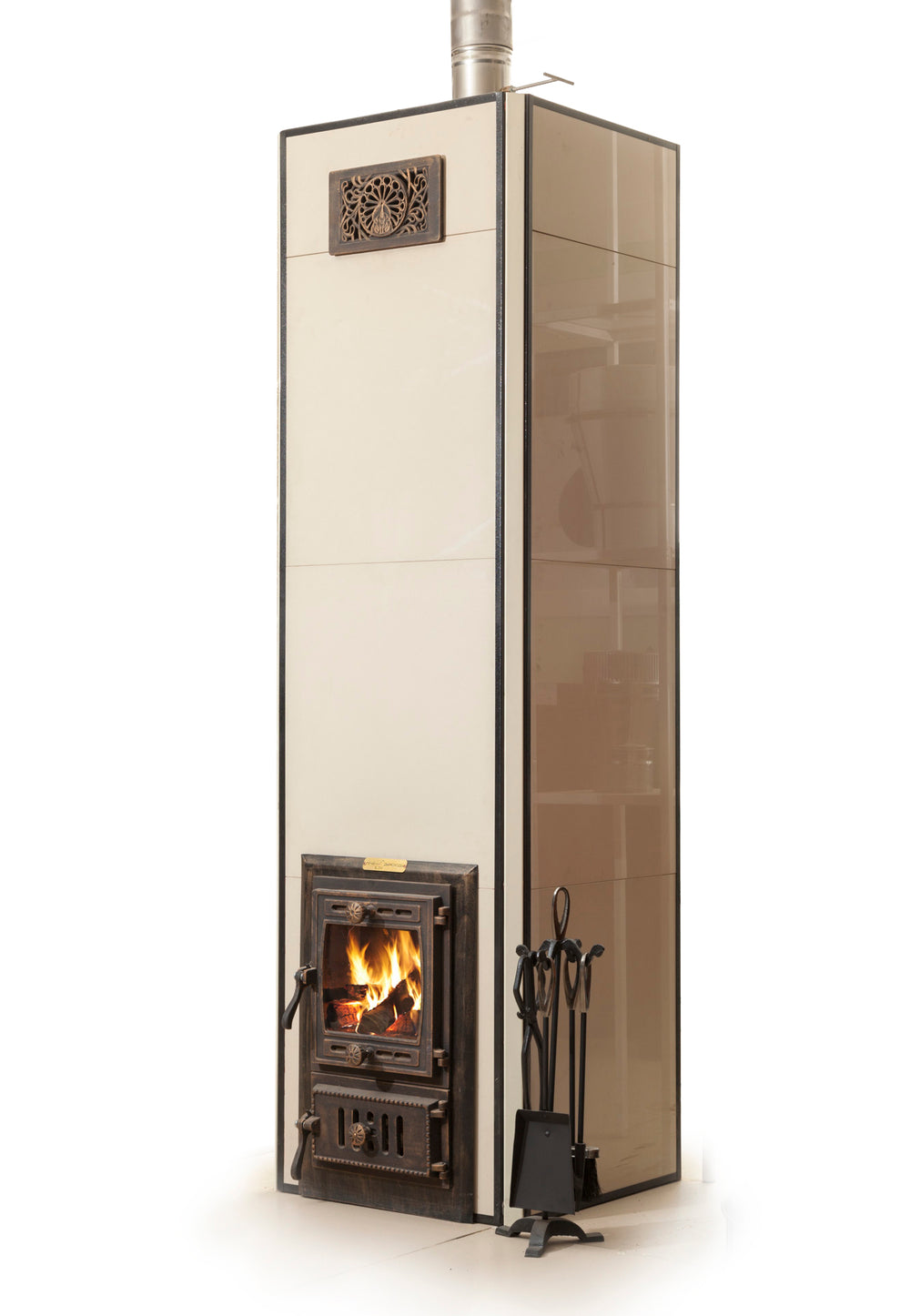 Mont-Tremblant DIY masonry heater kit featuring cream-colored large format tile cladding, decorative upper air vent, and glass firebox door.