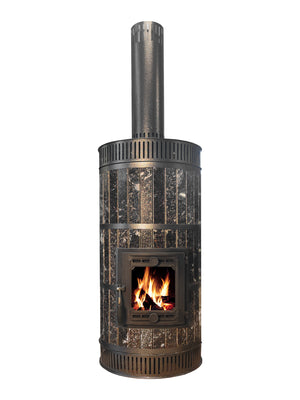 Front view of dark polished black stone masonry heater with tall chimney pipe and cast iron firebox door