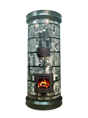 Front view of the Siberia model masonry heater kit in green serpentine stone with green trim, featuring a glass firebox door with a wood fire burning.