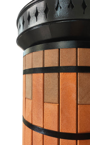 Close up detail of two-tone red and tan brick texture with metal tension bands