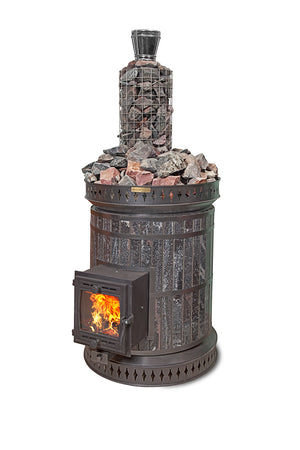 Volcano masonry sauna heater in black amphibolite stone featuring a wire mesh chimney basket filled with sauna rocks